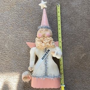 Pink creme queen/angel figure